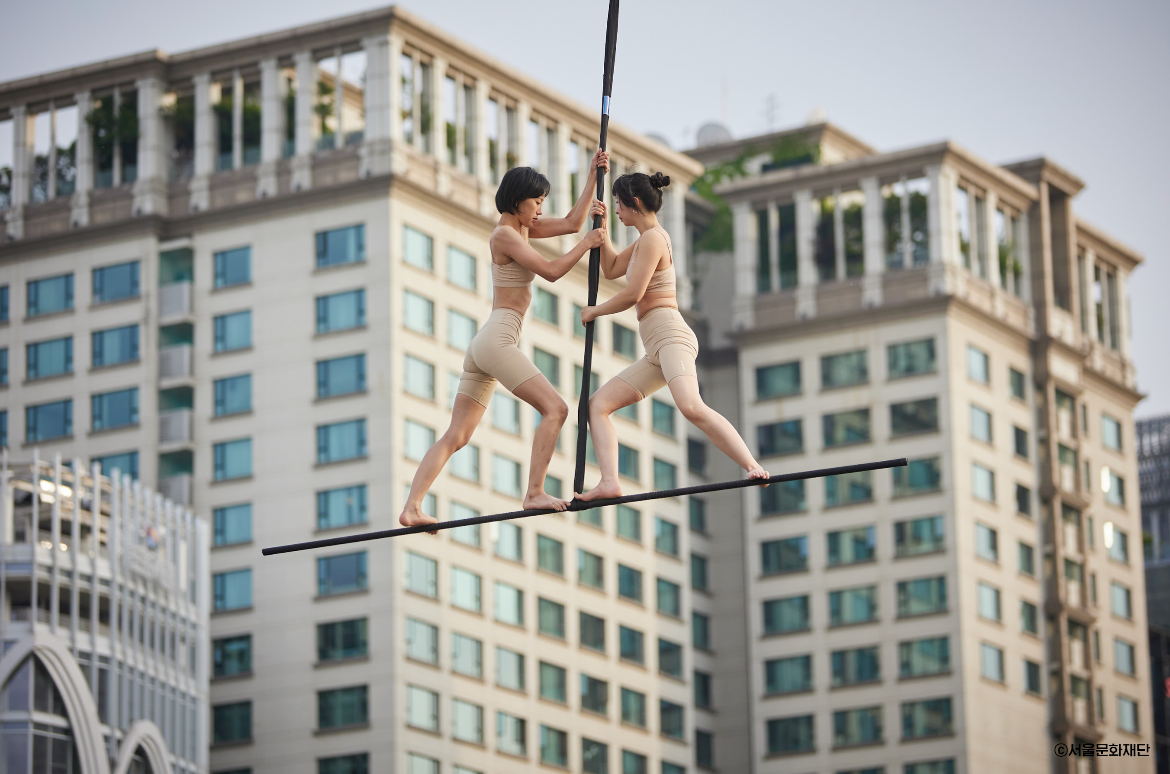 On a precarious imbalance, humans live and move.