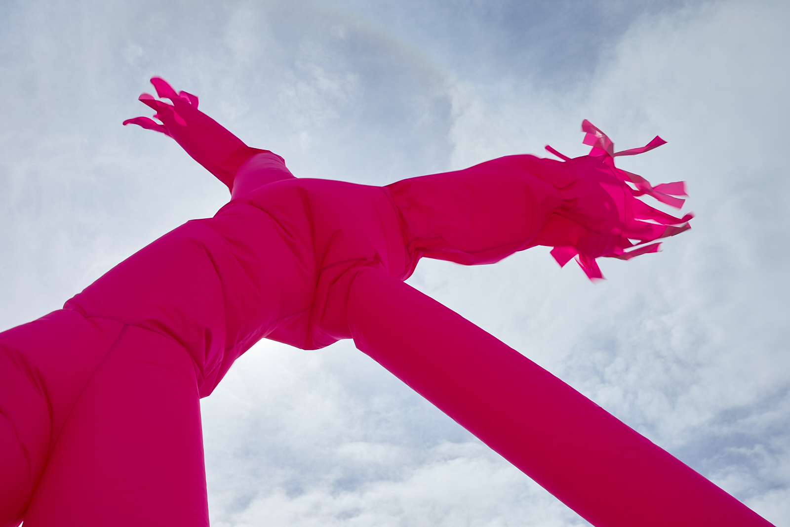 In Please Hold My Hand, giant pink inflatable sculptures greet visitors to Seoul Plaza, much like traditional totem poles. 